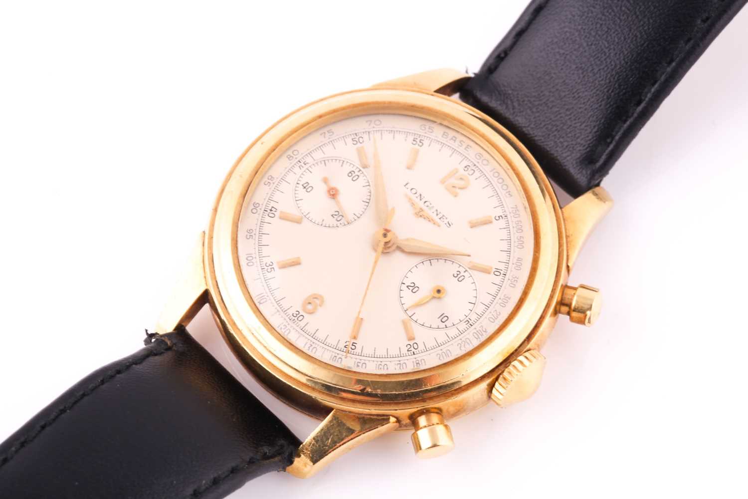 A gentleman's 18k yellow gold Longines Flyback chronograph wristwatch